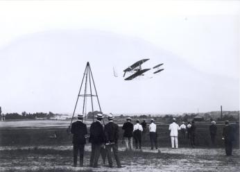 Wright Military Flyer flying at Ft Myer in 1909. Photo courtesy of the College Park Aviation Museum.
