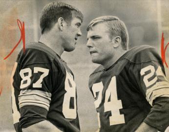 Jerry Smith (left) and Pete Larsen (right) during training camp in 1969. (Reprinted with permission of the DC Public Library, Star Collection, © Washington Post.)