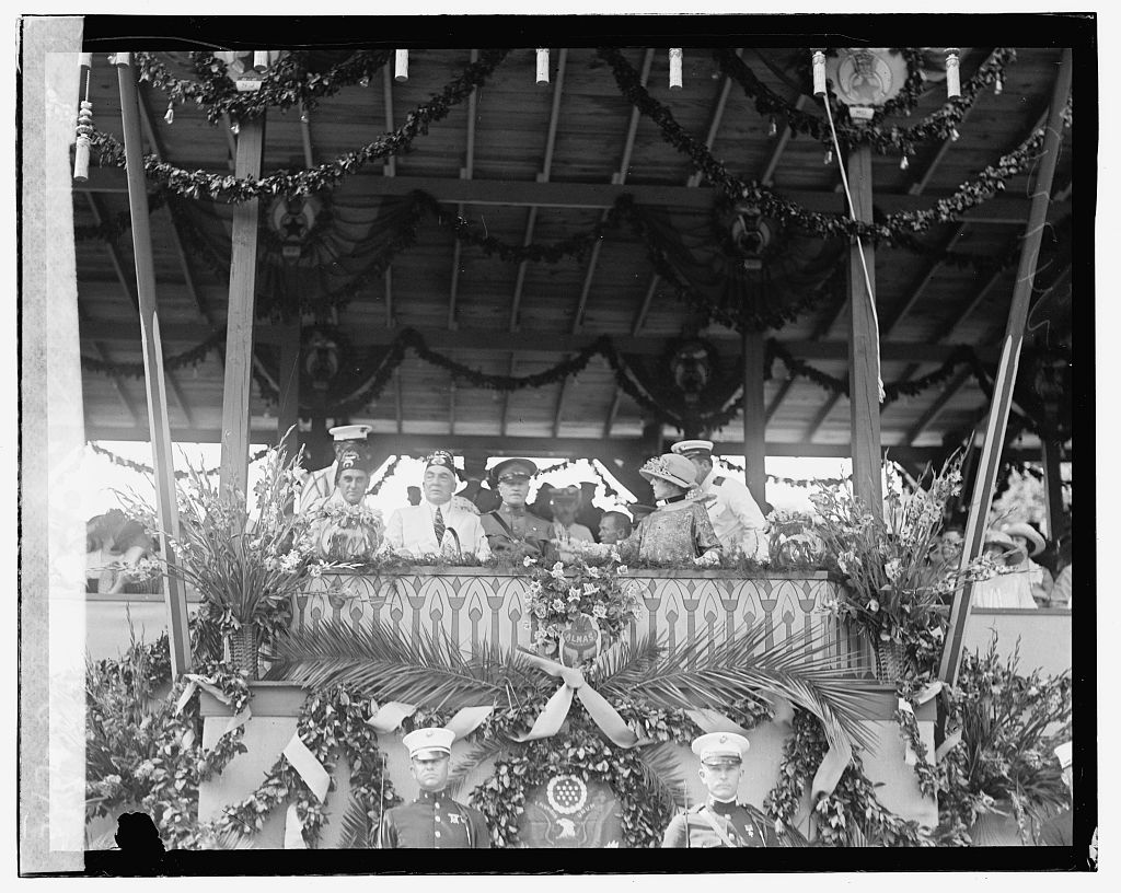 Shriners Parade, Washington, D.C. President receiving parade, Mrs. Harding & Pershing, 6/6/23. District of Columbia United States Washington D.C. Washington D.C, 1923. [June 6] Photograph. https://www.loc.gov/item/2016826882/.