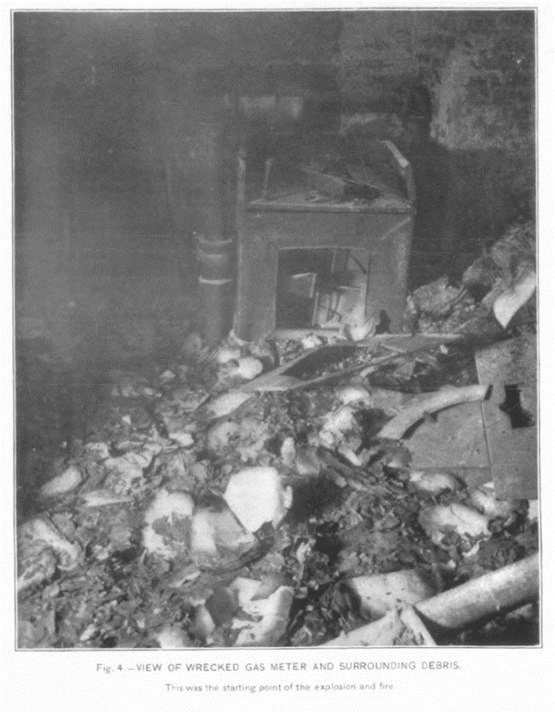 The gas meter that started the fire sits wrecked among ashes and rubble.