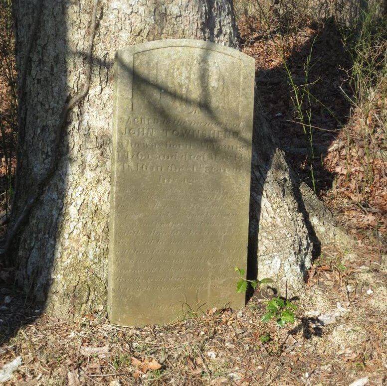 A photograph of John Townshend's grave with the following inscription: "Sacred to the memory of John Townshend who was born November 1, 1765 and died May 14, 1846 in the 81st year of his age. A man universally esteemed as a good citizen. Shrewd in his business transactions, in which as in everything else, he professed to be governed by his talking mind and personal interview with the Almighty."