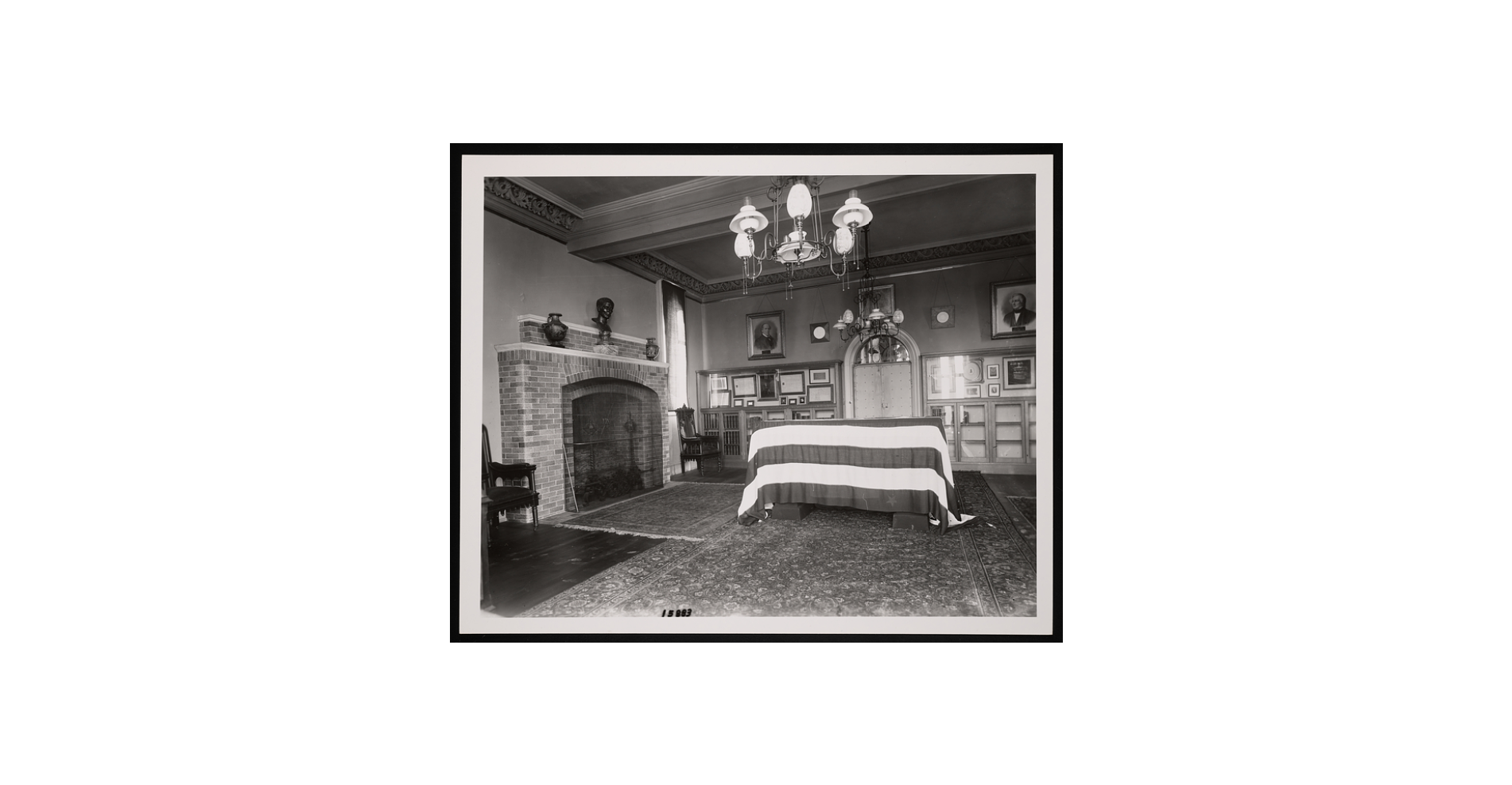 Smithson's body lying in the South Tower of the castle: his coffin is in the center of the room, draped in the American flag