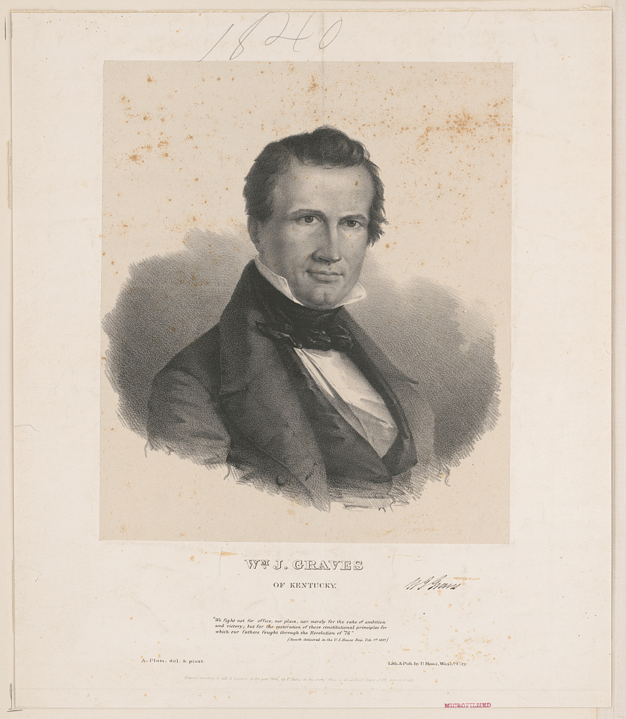 Portrait of William J. Graves. He is wearing a white shirt, black tie, and black coat.