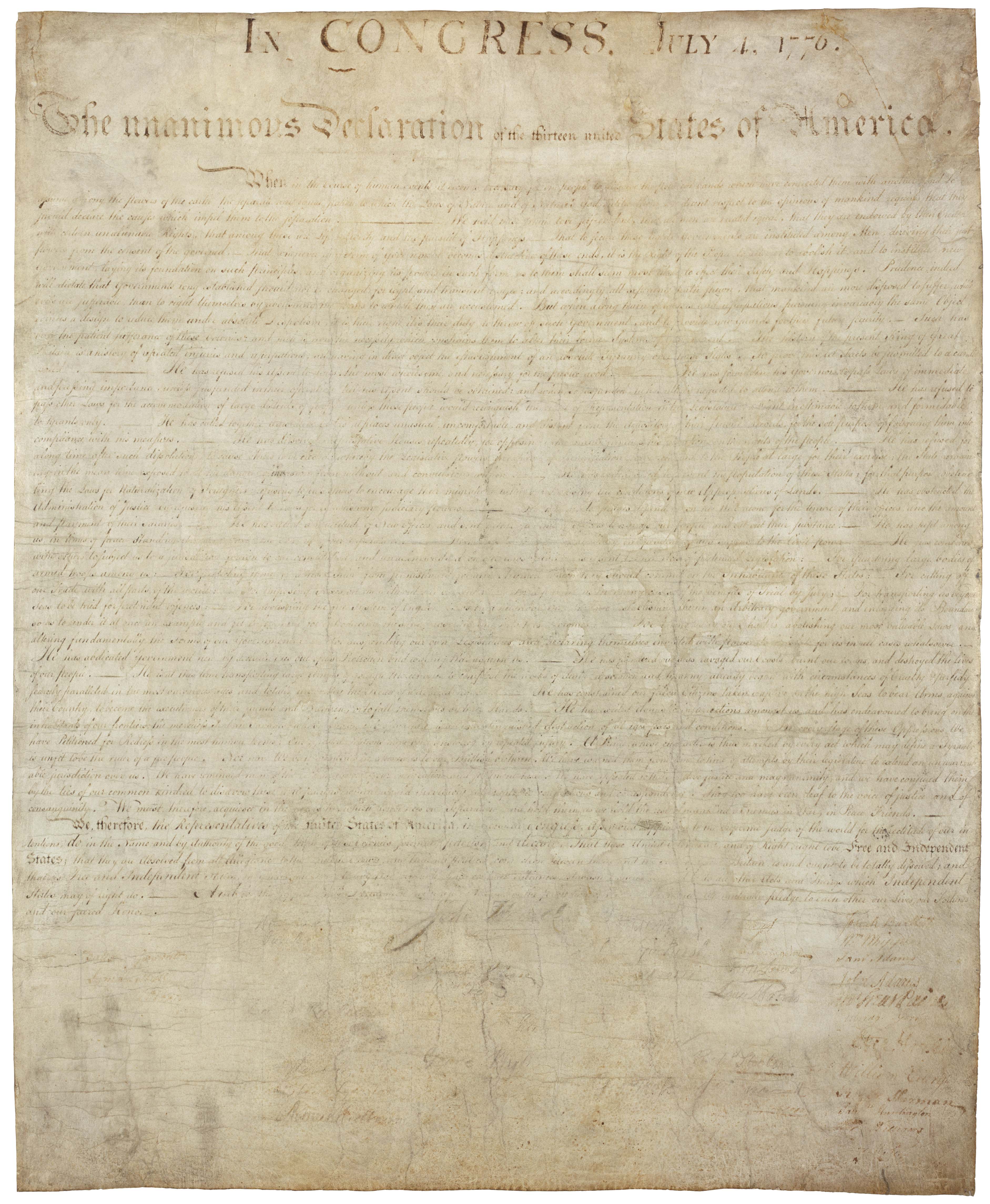 A high-resolution scan of the Declaration of Independence, showing the extremely faded ink and mysterious handprint on the bottom left corner (Source: National Archives)