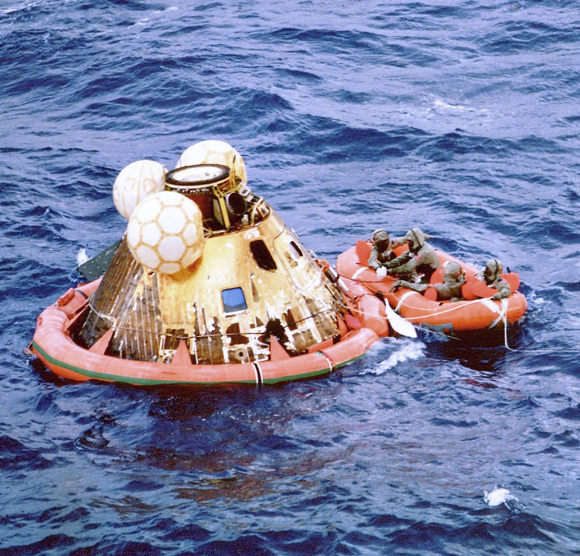 “Apollo 11 Crew and a Navy Diver Await Pickup from the USS Hornet after Splashdown.” 1969. https://commons.wikimedia.org/wiki/File:Splashdown_3.jpg.