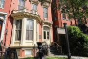 Front of Mary McLeod Bethune Council House, which has brick facade and large bay window.