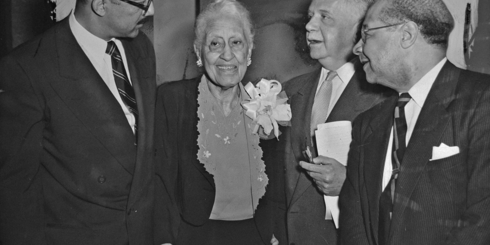 Mary Church Terrell stands with three African American men in 1953. (Reprinted with permission of the DC Public Library, Star Collection, © Washington Post.)