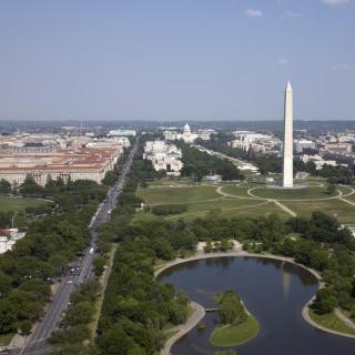 The Washington Mall from behind the Washington Monument, with the museums and other buildings visible in the distance