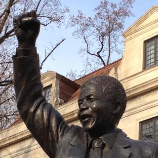 Nelson Mandela statue which stands outside South African Embassy in Washington, DC. (Credit: Flickr user futureatlas.com. Used via Creative Commons Attribution 2.0 Generic license.)