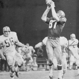 Jerry Smith jumps and reaches to catch a pass over his head during a September 1969 game.