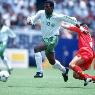 Saudi Arabia's Saeed Owairan is challenged by a Belgian at the 1994 World Cup in RFK Stadium, Washington, D.C. (Photo by Bob Thomas Sports Photography via Getty Images)