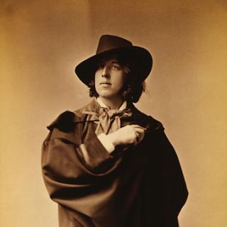 This man knows how to rock a cape. (1882 photograph of Oscar Wilde by Napoleon Sarony. Source: Wikipedia Commons)