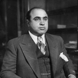 Al Capone in 1930 as photographed by the FBI's Chicago Bureau (Source: Wikipedia)