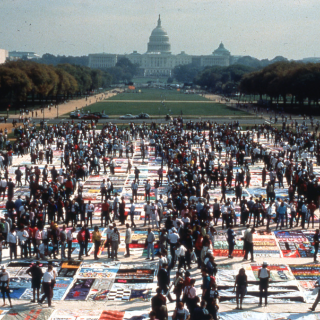 March participants view the AIDS Memorial Quilt on the National Mall on October 11, 1987. (Photograph courtesy of The NAMES Project.)