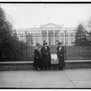 Members of the League of Women Voters of the District of Columbia protest outside the White House in 1924