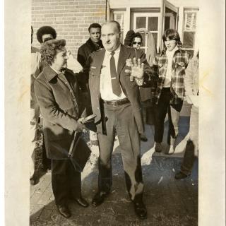 Lt. O.W. Larsen talks with his wife shortly after his release. (Photo Credit: Ken Heinen, Reprinted with permission of the DC Public Library, Star Collection, © Washington Post.)