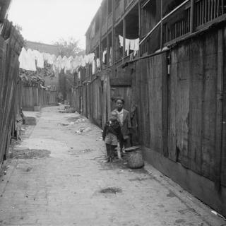 Two African American children in Washington, D.C. alley (Photo source: Library of Congress)