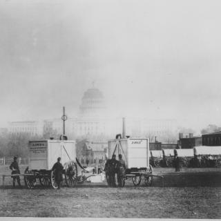 Gas generators on the National Mall with the Capitol Building in the background.
