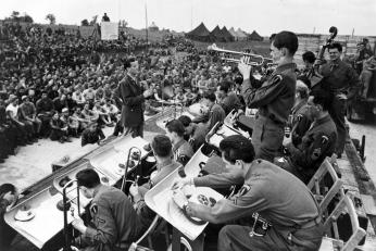 Glenn Miller’s band plays for US and Allied troops in England, Jun-Dec 1944. (Photo Source: U.S. Air Force, Public Domain) http://www.nationalmuseum.af.mil/Visit/Museum-Exhibits/Fact-Sheets/Display/Article/196150/maj-glenn-miller-army-air-force-band/