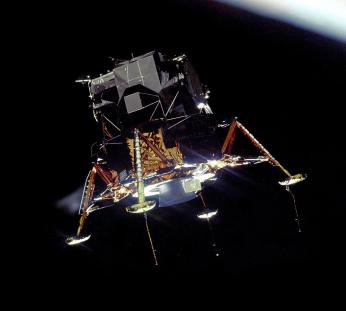“Apollo 11 Lunar Module Eagle in Landing Configuration in Lunar Orbit from the Command and Service Module Columbia.” 1969. <a href=