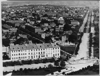 Handy, Levin C, photographer. SE view from dome of U.S. Capitol, showing Carroll Row present site of Library of Congress in left foreground. Washington D.C, ca. 1880. Photograph. https://www.loc.gov/item/2005697020/. Handy, Levin C, photographer. SE view from dome of U.S. Capitol, showing Carroll Row present site of Library of Congress in left foreground. Washington D.C, ca. 1880. Photograph. <a href=