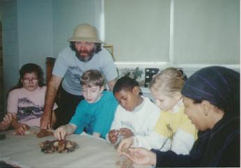 Paleontologist Peter M. Kranz teaches an elementary class about fossils.