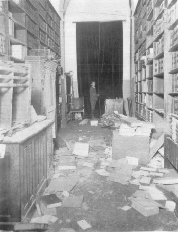 Though they were spared from the fire, these books were blown off shelves by the explosion's force.