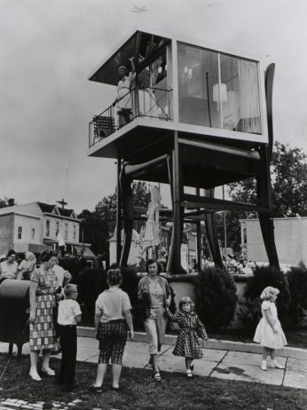 Lynn Arnold waves to onlookers from her glass apartment atop the Big Chair in Anacostia. (Reprinted with permission of the DC Public Library, Star Collection, © Washington Post.)