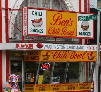 The exterior of Ben's Chili Bowl, with a big yellow-and-red sign with the restaurant's name