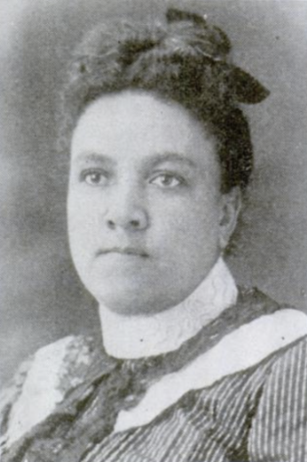 Portrait of Mamie Hilyer, an African-American woman with her hair in a bun and wearing a striped dress with a lace collar.