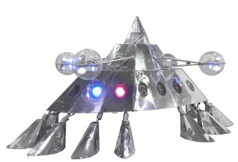 The Mothership stage prop, a silver spaceship with eight legs and lights. Source: The Smithsonian