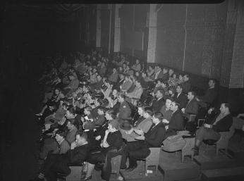 Spectators sitting in rows in Turner's Arena in 1942