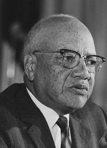 President Nabrit, pictured in suit and glasses, at a 1967 press conference. 