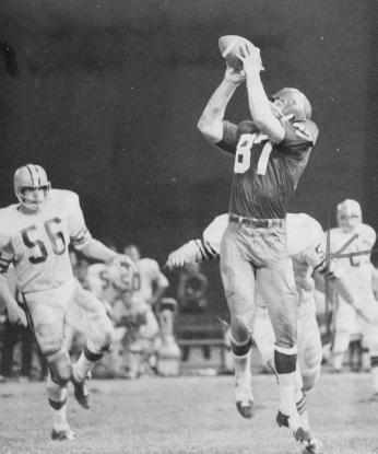 Jerry Smith jumps and reaches to catch a pass over his head during a September 1969 game.