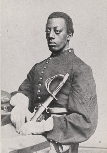 Young African American man in Civil War era military uniform.