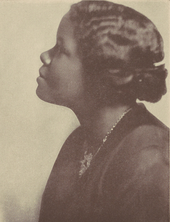 a historic photograph of a woman in profile