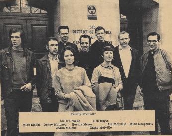 Seven men and two women pose for a photo (credit: Joann Malone) 