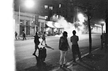 Youth clash with police during 1991 riots in Washington's Mount Pleasant neighborhood. (Source: Flickr user secorlew. Used via Creative Commons Attribution-NonCommercial-NoDerivs 2.0 Generic license.)