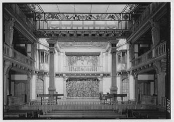 “Folger Shakespeare Library, 201 E. Capitol St., Washington, D.C. Theater to stage, axis view II” (Photo Source: The Library of Congress) Cret, Paul Phillippe, Architect, Paul Phillippe Cret, and Alexander B Trowbridge, Gottscho, Samuel H, photographer. Folger Shakespeare Library, 201 E. Capitol St., Washington, D.C. Theater to stage, axis view II. Washington D.C, 1932. Photograph. https://www.loc.gov/item/gsc1994012125/PP/.