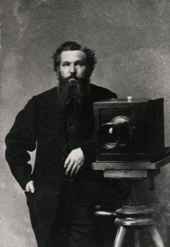 Portrait of Alexander Gardner with a camera, taken around 1860