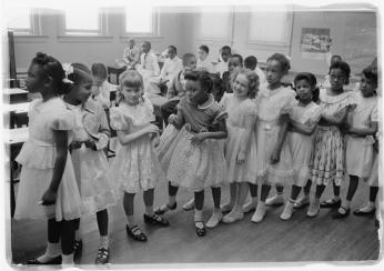 Integrated Classroom, May 1955 Young children stand in line in an integrated classroom at Barnard School in May 1955