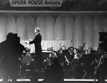 AR7606-L. Entertainer, Danny Kaye, Conducts Orchestra at Fundraising Event for the National Cultural Center, November 29, 1962. (Photo Source: John F. Kennedy Presidential Library and Museum) AR7606-L, Abbie Rowe. White House Photographs. John F. Kennedy Presidential Library and Museum, Boston Entertainer, Danny Kaye, Conducts Orchestra at Fundraising Event for the National Cultural Center, November 29, 1962.