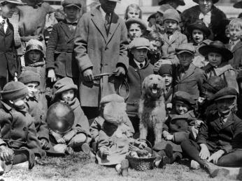 "Laddie Boy" acted as host of the 1923 White House Easter Egg Roll, to the delight of the hundreds of children who attended.  Wilson Jackson, his caretaker, holds his leash. (Photo credit: Library of Congress, LOT 12295, v. 3)