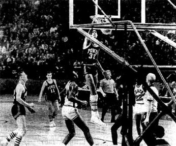 Lew Alcindor throws down a slam dunk in the 1965 game between Power Memorial Academy and DeMatha Catholic at Cole Field House. Dematha won the game and ended Power Memorial's 71 game winning streak. (Photo source: The Washington Star)