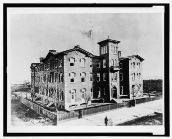 External view of the State Department building in 1866-1875.