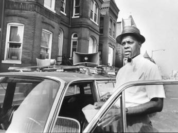 Hobson with his station wagon and trademark pipe and fedora, ready to harangue the multitudes. (Source: Evening Star)