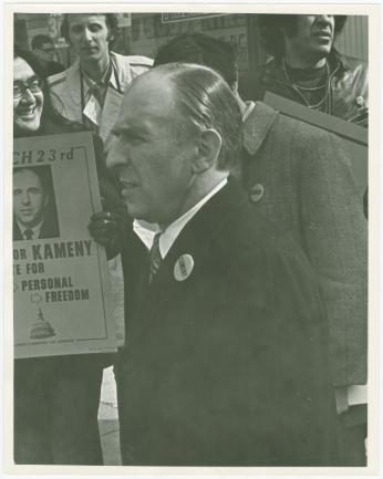 Frank Kameny stands in front of campaign staff and volunteers