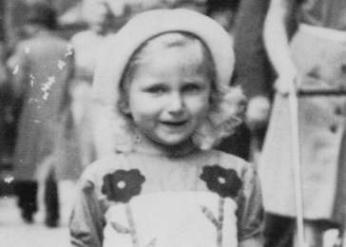 Portrait of Josiane Aizenberg walking down the streets of Brussels, circa 1941