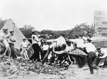 Bonus marchers tussle with local police at their campsite in 1932. Credit: National Archives