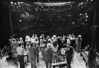 The cast of Inherit the Wind and the audience giving each other a standing ovation in Moscow (Source: Arena Stage)
